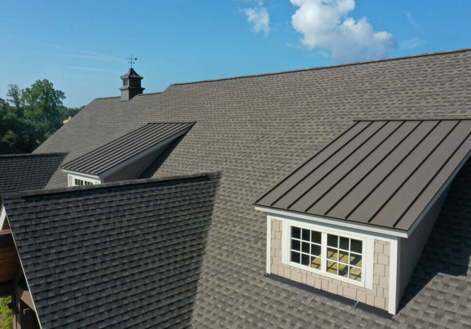 Typical home roof fitted with asphalt shingles.
